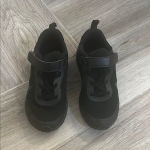 Kids Black Nike shoes